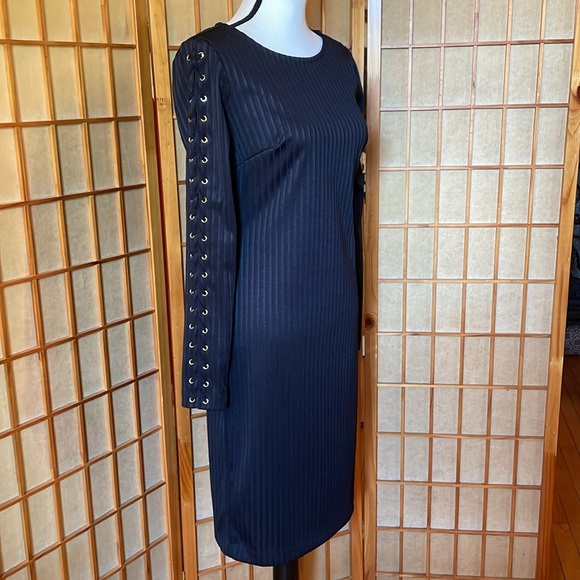 Jennifer Lopez Dresses & Skirts - Jennifer Lopez Dress Black Grommet Lace Up Long Sleeves Bodycon Dress